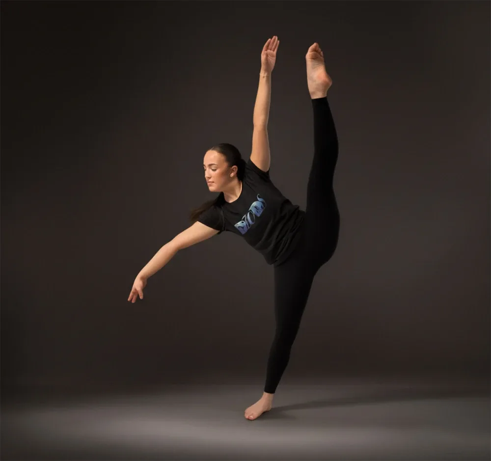 Young dancer performing a standing split